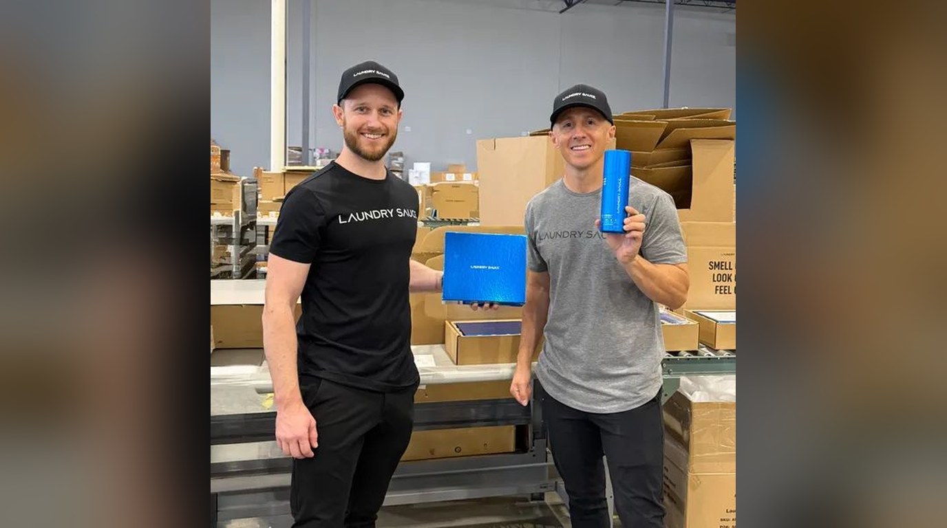 Robert and co-founder Ian Blair in the Laundry Sauce warehouse holding product